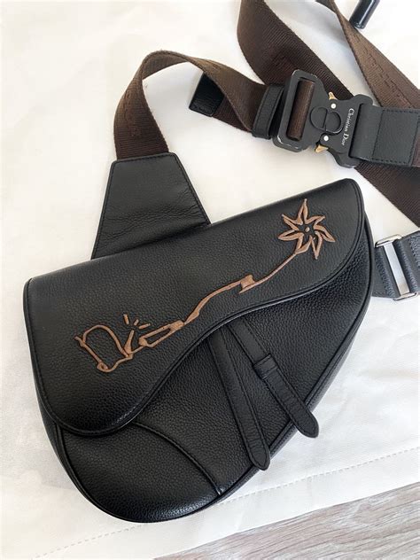 travis scott dior saddle bag|Dior x Cactus Jack: Apparel, Accessories & More .